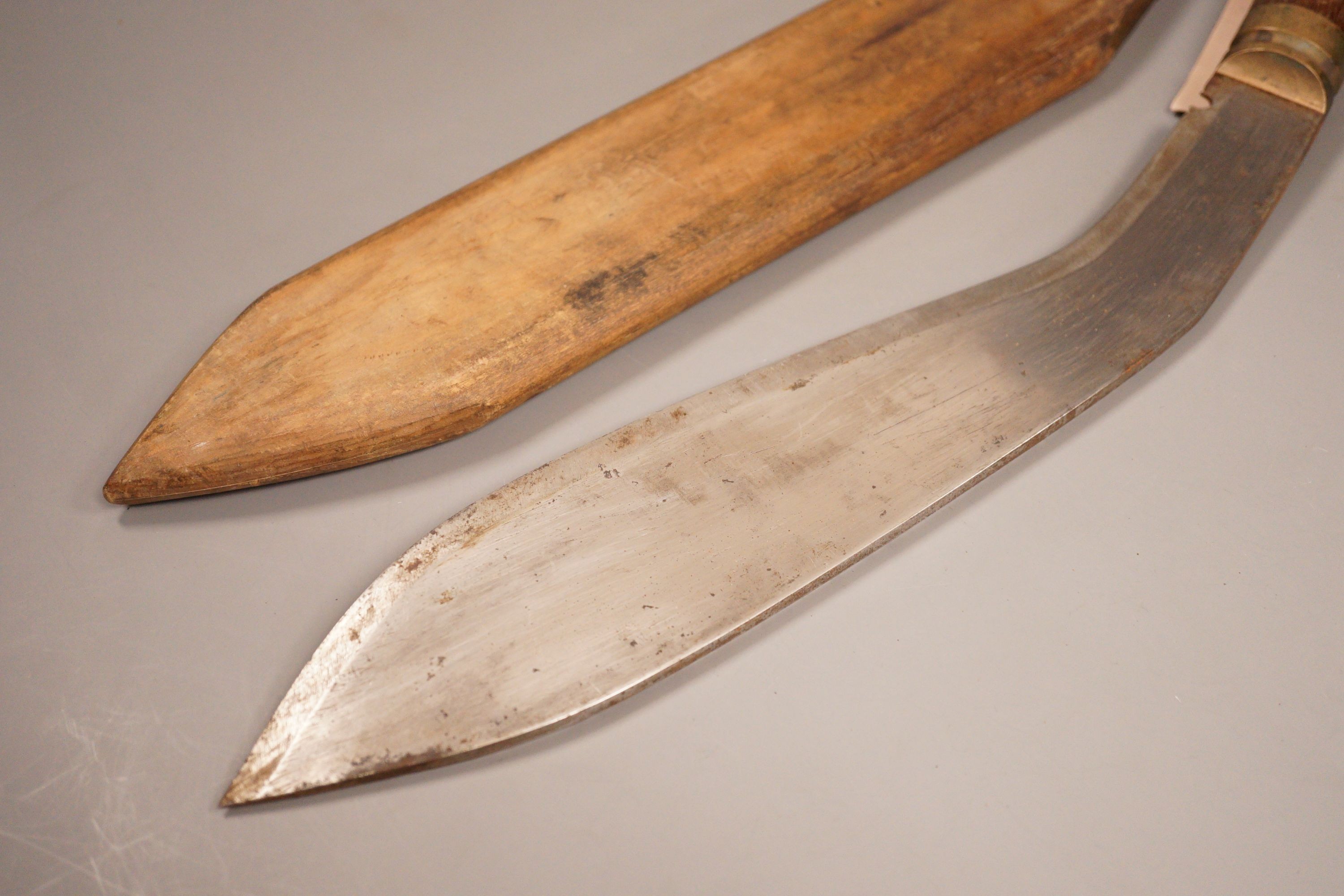 A kukri with hardwood handle and sheath